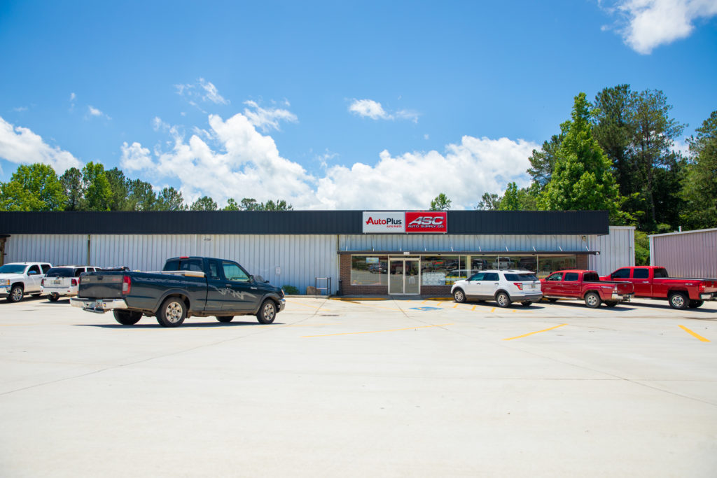 panoramic view of the outside of the auto supply company store